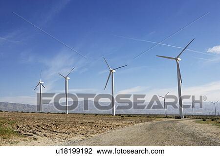 Stock Image - Wind turbines in desert. Fotosearch