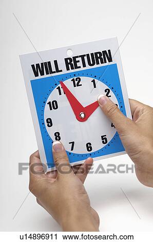 Woman adjusting hands of Will return clock, close-up View Large Photo Image Stock Image - Woman adjusting hands of Will return clock, close-up. Fotosearch