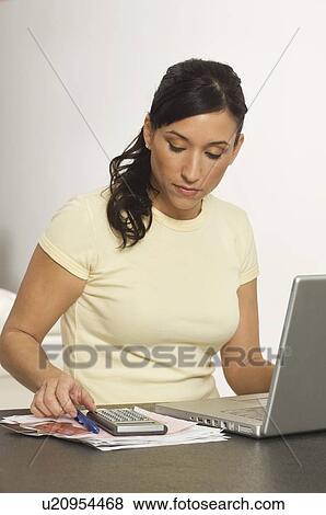 Stock Photo - Woman Doing Bills. Fotosearch