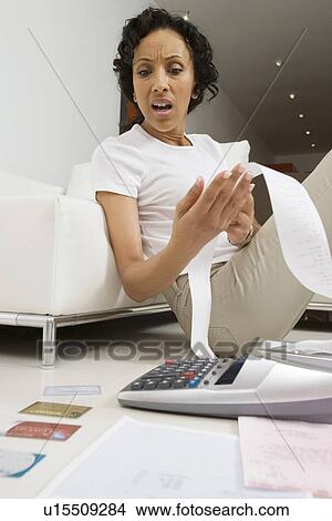 Picture - Woman in Shock About Money. Fotosearch