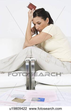 Stock Image - Woman Placing Order on Cell Phone. Fotosearch