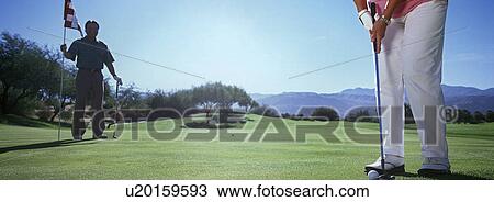 Woman playing golf, low section View Large Photo Image Stock Image - Woman playing golf, low section. Fotosearch