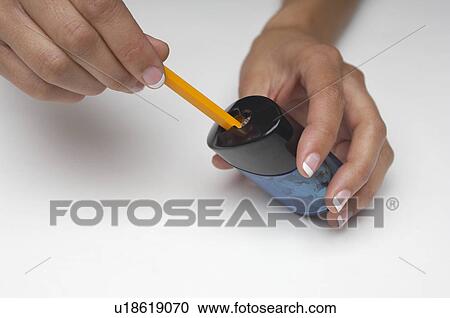 Woman sharpening pencil, close-up of hands View Large Photo Image Stock Image - Woman sharpening pencil, close-up of hands. Fotosearch
