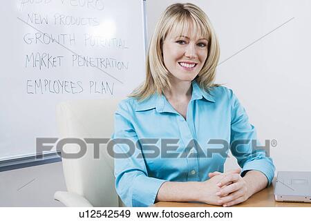 Woman Sitting in Front of Whiteboard View Large Photo Image Stock Photo - Woman Sitting in Front of Whiteboard. Fotosearch