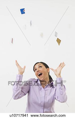 Woman Tossing Credit Cards in the Air View Large Photo Image Stock Image - Woman Tossing Credit Cards in the Air. Fotosearch