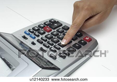 Woman using calculator, close-up of finger View Large Photo Image Stock Image - Woman using calculator, close-up of finger. Fotosearch