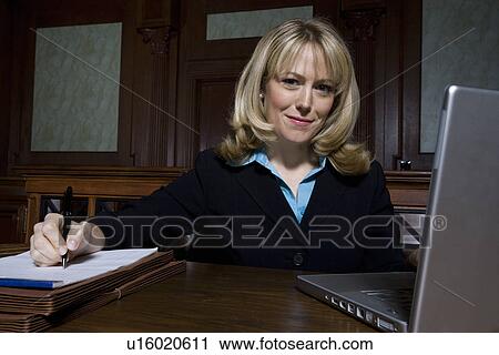Woman working in court, portrait View Large Photo Image Stock Image - Woman working in court, portrait. Fotosearch