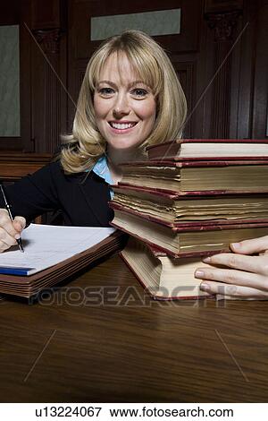Stock Photo - Woman working in court, portrait. Fotosearch