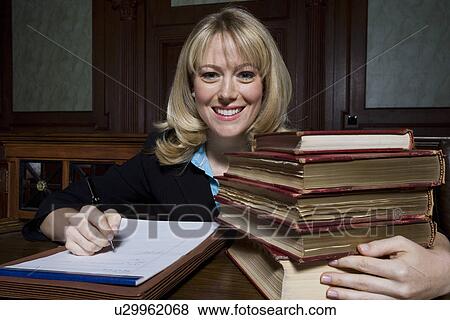 Stock Photo - Woman working in court, portrait. Fotosearch