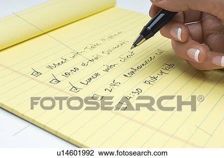 Woman writing list of tasks to do, close-up of hand View Large Photo Image Stock Image - Woman writing list of tasks to do, close-up of hand. Fotosearch