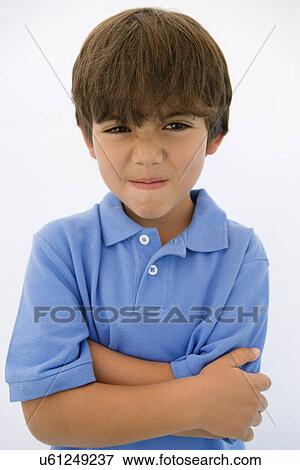 Stock Photo - Young Boy Making Face. Fotosearch