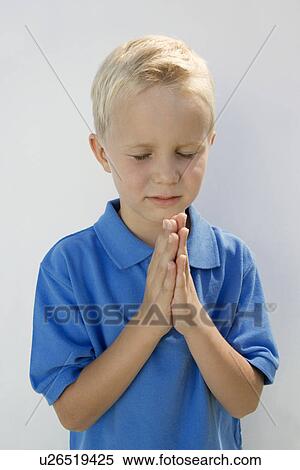 Young Boy Praying View Large Photo Image Stock Photography - Young Boy Praying. Fotosearch