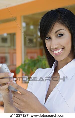 Young Woman Texting View Large Photo Image Stock Photo - Young Woman Texting. Fotosearch