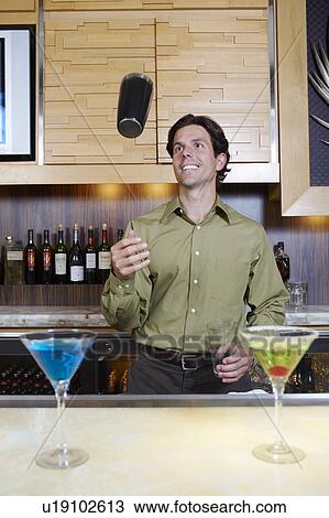 Bartender Tossing Shaker in the Air View Large Photo Image Stock Image - Bartender Tossing Shaker in the Air. Fotosearch