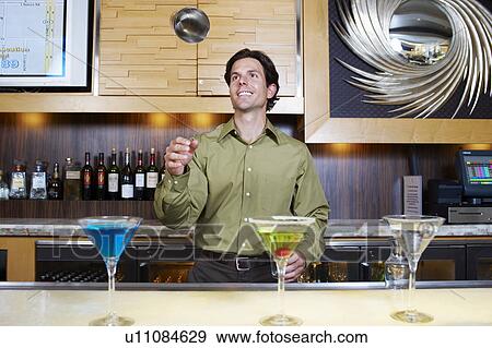 Bartender Tossing Shaker in the Air View Large Photo Image Stock Photo - Bartender Tossing Shaker in the Air. Fotosearch