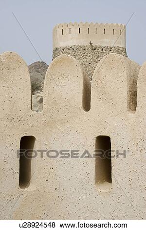 Stock Photo - Bidyah, UAE, two watchtowers overlooking Al Bidyah Mosque built in 1446. Fotosearch