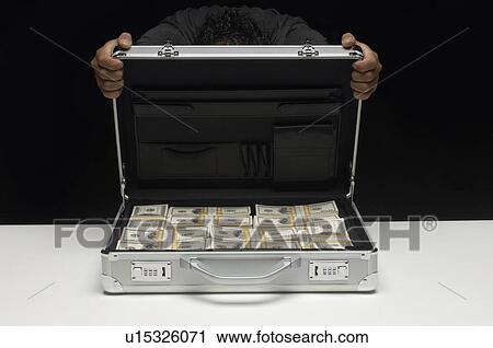 Stock Image - Briefcase Full of Money. Fotosearch