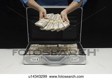 Briefcase Full of Money View Large Photo Image Stock Photo - Briefcase Full of Money. Fotosearch