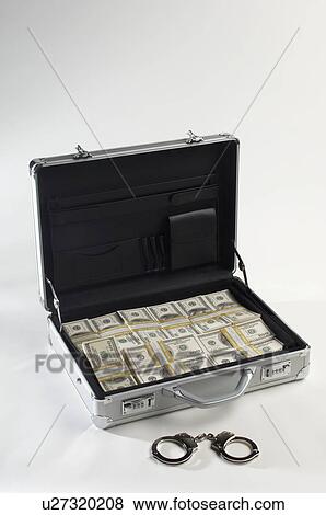 Stock Photo - Briefcase Full of Money. Fotosearch