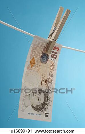 British paper currency on clothesline View Large Photo Image Stock Image - British paper currency on clothesline. Fotosearch