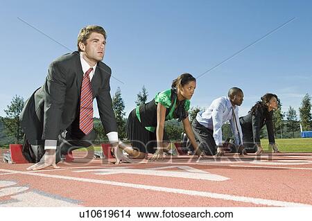 Business People At Starting Blocks View Large Photo Image Picture - Business People At Starting Blocks. Fotosearch