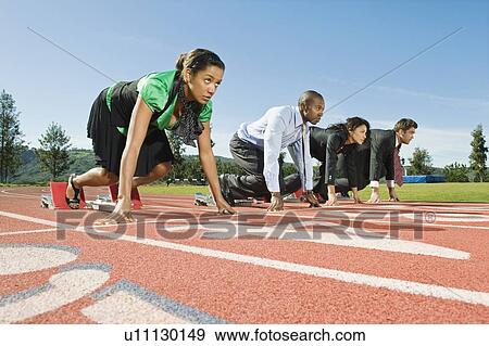 Business People At Starting Blocks View Large Photo Image Stock Photo - Business People At Starting Blocks. Fotosearch