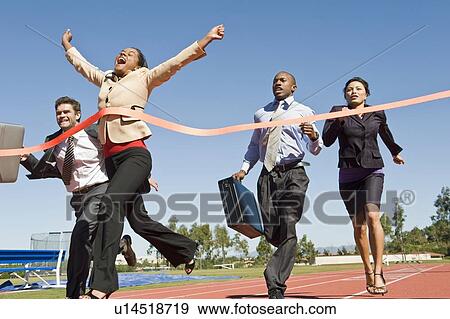 Business People Crossing the Winning Line View Large Photo Image Stock Photo - Business People Crossing the Winning Line. Fotosearch