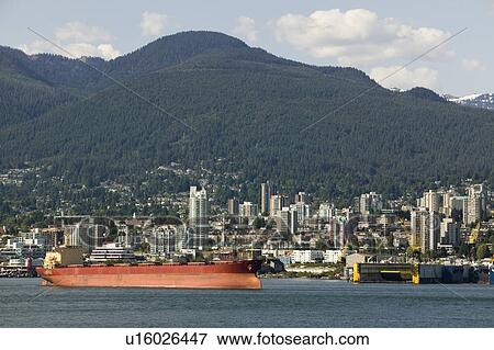 Stock Photo - Cargo ship in Vancouver Harbour, British Columbia. Fotosearch