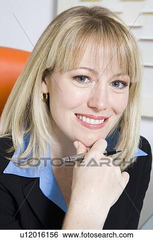 Stock Photograph - Cheerful Financial Advisor. Fotosearch
