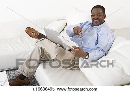 Cheerful Senior Man Using Laptop View Large Photo Image Stock Photography - Cheerful Senior Man Using Laptop. Fotosearch