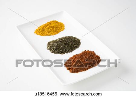 Chilli, green tea and turmeric View Large Photo Image Stock Photograph - Chilli, green tea and turmeric. Fotosearch