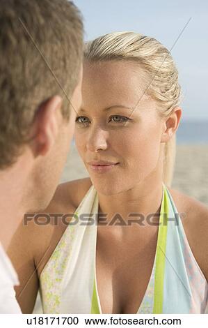 Stock Image - Couple face to face, close up. Fotosearch