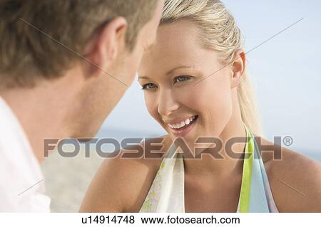 Stock Photo - Couple face to face, close up. Fotosearch