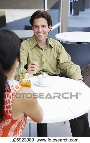 Couple in a Cafe View Large Photo Image Stock Photo - Couple in a Cafe. Fotosearch