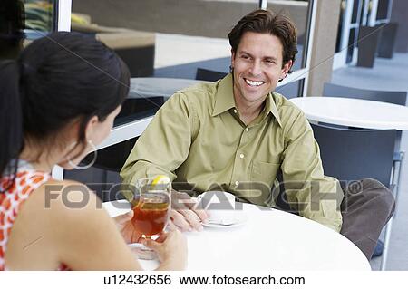 Stock Photograph - Couple in a Cafe. Fotosearch