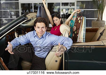 Couple in a Convertible View Large Photo Image Stock Photograph - Couple in a Convertible. Fotosearch