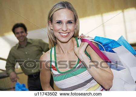 Couple on a Shopping Trip View Large Photo Image Stock Image - Couple on a Shopping Trip. Fotosearch