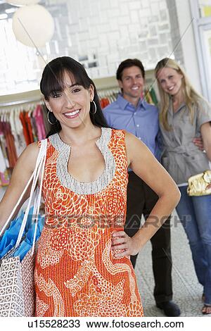 Stock Image - Customers in a Clothing Store. Fotosearch