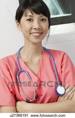 Doctor in hospital, portrait View Large Photo Image Stock Image - Doctor in hospital, portrait. Fotosearch