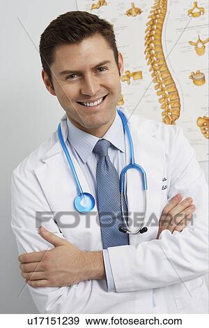 Stock Photo - Doctor in hospital, portrait. Fotosearch