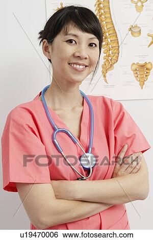 Stock Photograph - Doctor in hospital, portrait. Fotosearch