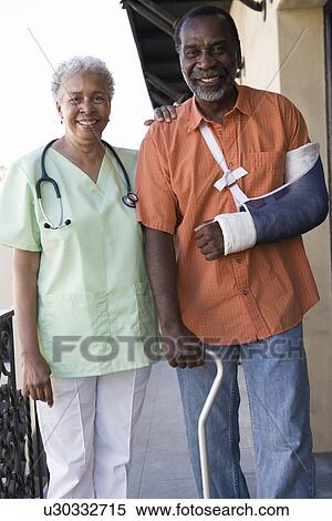 Stock Photography - Doctor with patient. Fotosearch