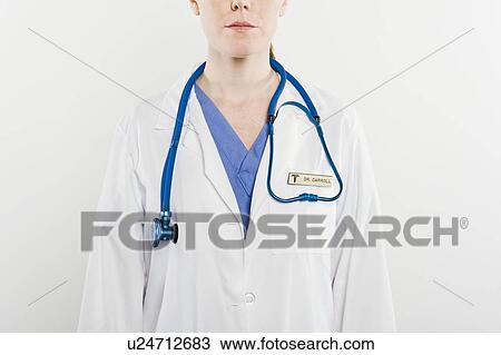 Doctor with stethoscope, mid section View Large Photo Image Stock Image - Doctor with stethoscope, mid section. Fotosearch