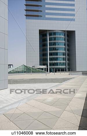 Stock Photo - Dubai, UAE, Architectural detail of Emirates Towers plaza on Sheikh Zayed Road. Fotosearch