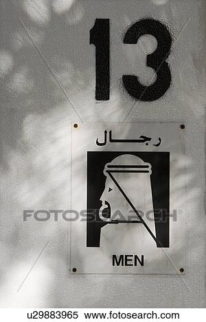Dubai, UAE, symbol for men's restroom in Creekside Park in Bur Dubai View Large Photo Image Stock Photography - Dubai, UAE, symbol for men's restroom in Creekside Park in Bur Dubai. Fotosearch