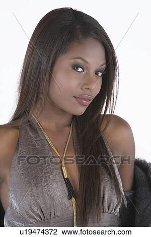 Stock Image - Fashion model in halterneck dress. Fotosearch