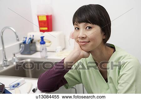 Female doctor in hospital, portrait View Large Photo Image Stock Photography - Female doctor in hospital, portrait. Fotosearch