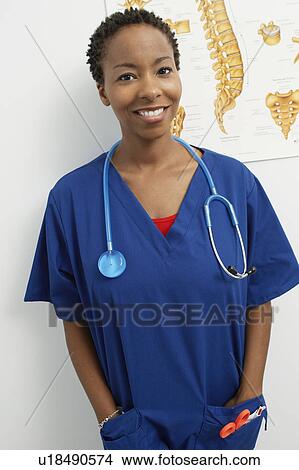 Picture - Female nurse in hospital, portrait. Fotosearch
