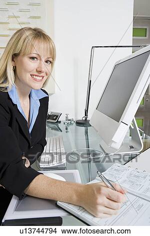 Picture - Financial Advisor Using Computer. Fotosearch