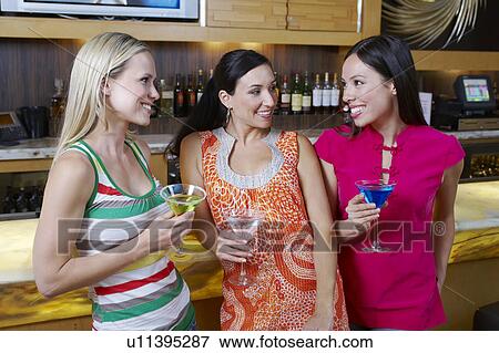 Stock Photo - Friends at a Bar. Fotosearch